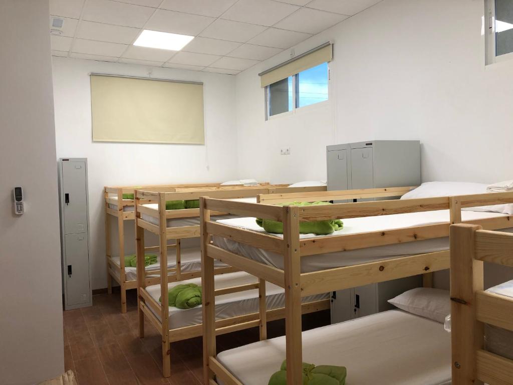 Postel nebo postele na pokoji v ubytování Albergue Delta