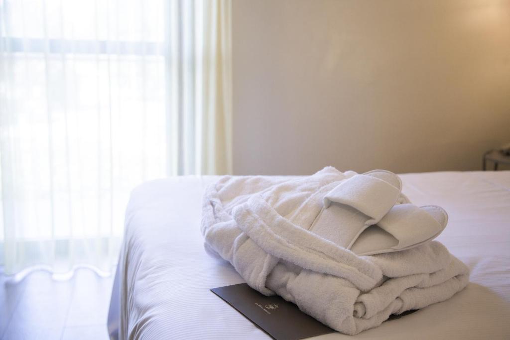 Postel nebo postele na pokoji v ubytování Hotel Parigi 2 & Spa