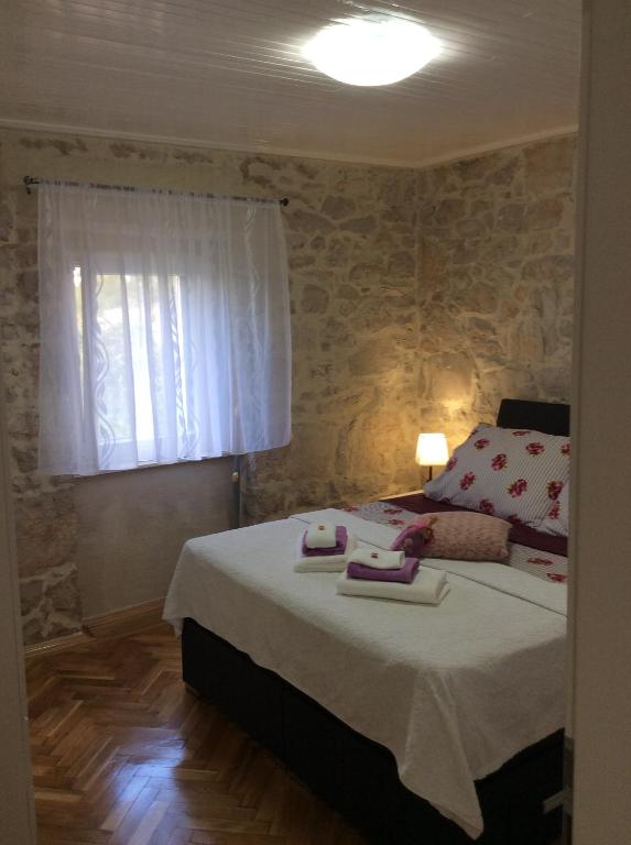 Postel nebo postele na pokoji v ubytování Apartment Karla SNB