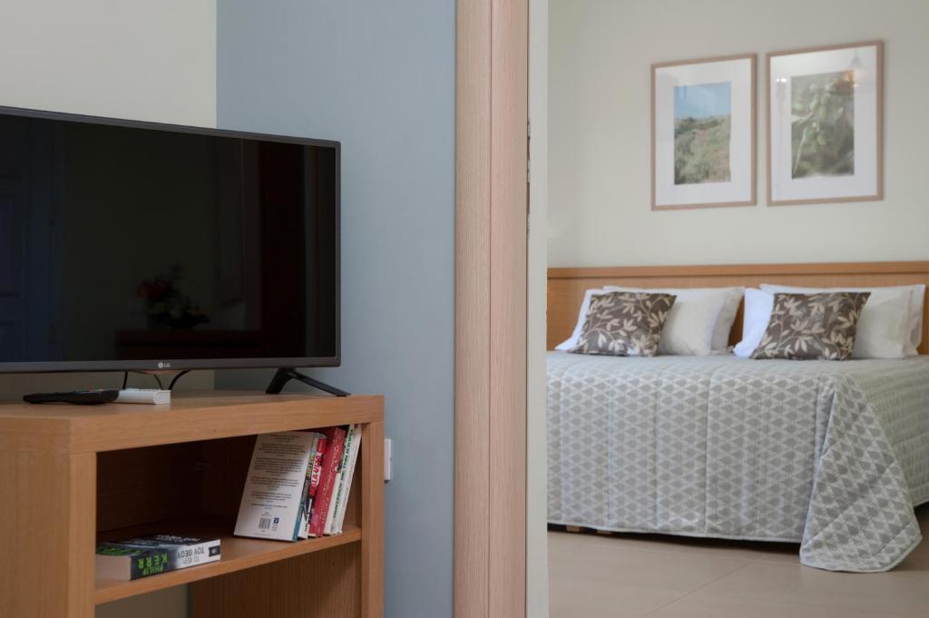 TV a/nebo společenská místnost v ubytování Hotel Estia
