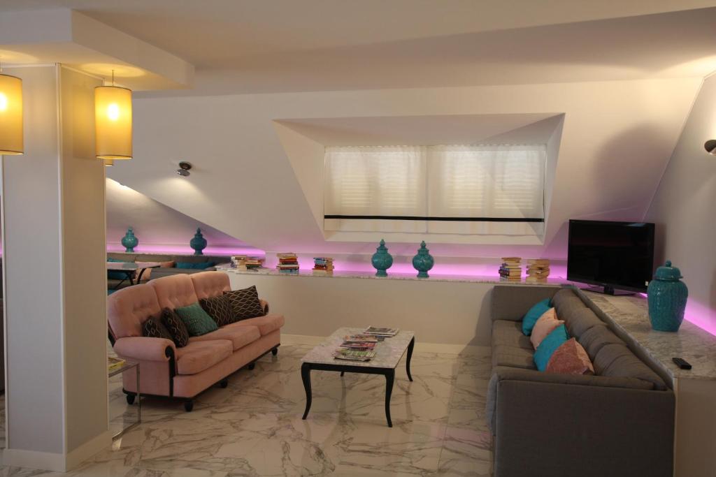A seating area at Hotel Naxos B&B