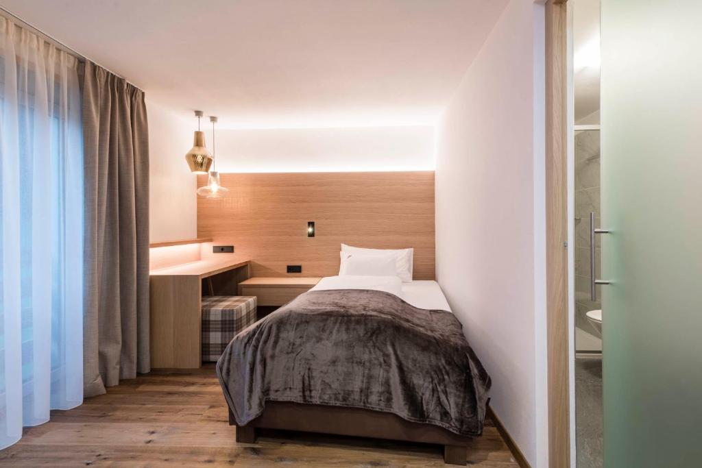 Postel nebo postele na pokoji v ubytování Villa Tony - Small Romantic Hotel