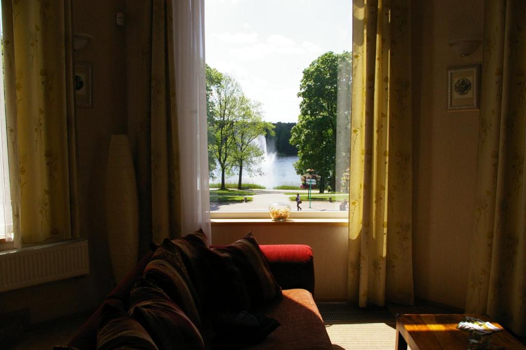 Posezení v ubytování Guest House Senasis Pastas
