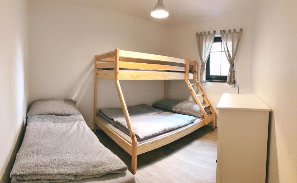 Postel nebo postele na pokoji v ubytování Apartmány Sportrelax