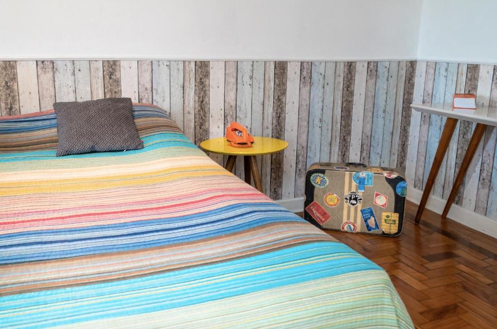Postel nebo postele na pokoji v ubytování Paradiso Hostel & Suites - TOP 1 DE SÃO PAULO