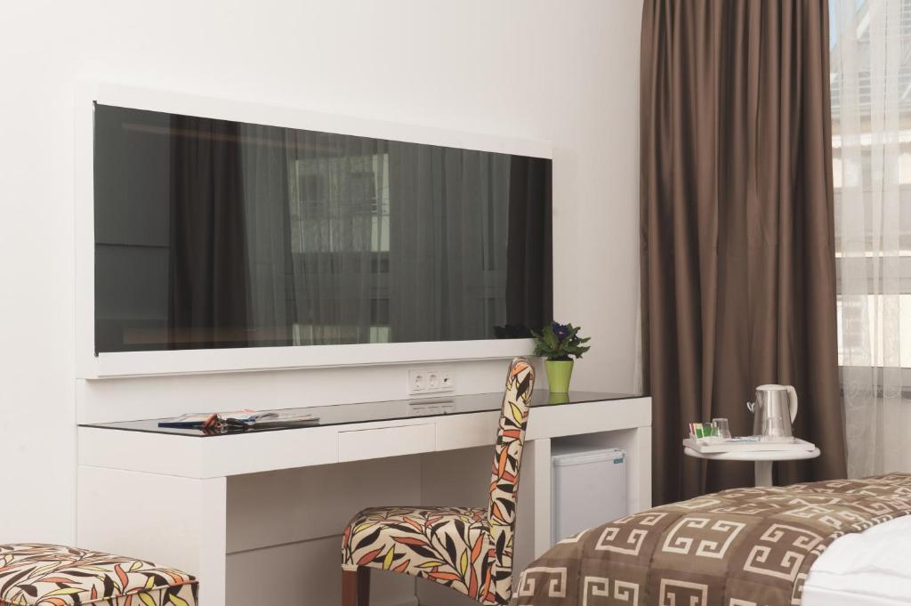 TV a/nebo společenská místnost v ubytování Hotel Bayer's