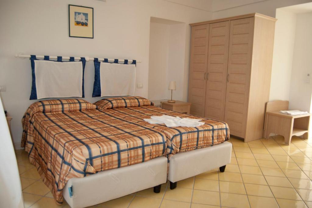 Letto o letti in una camera di Villa Giusto