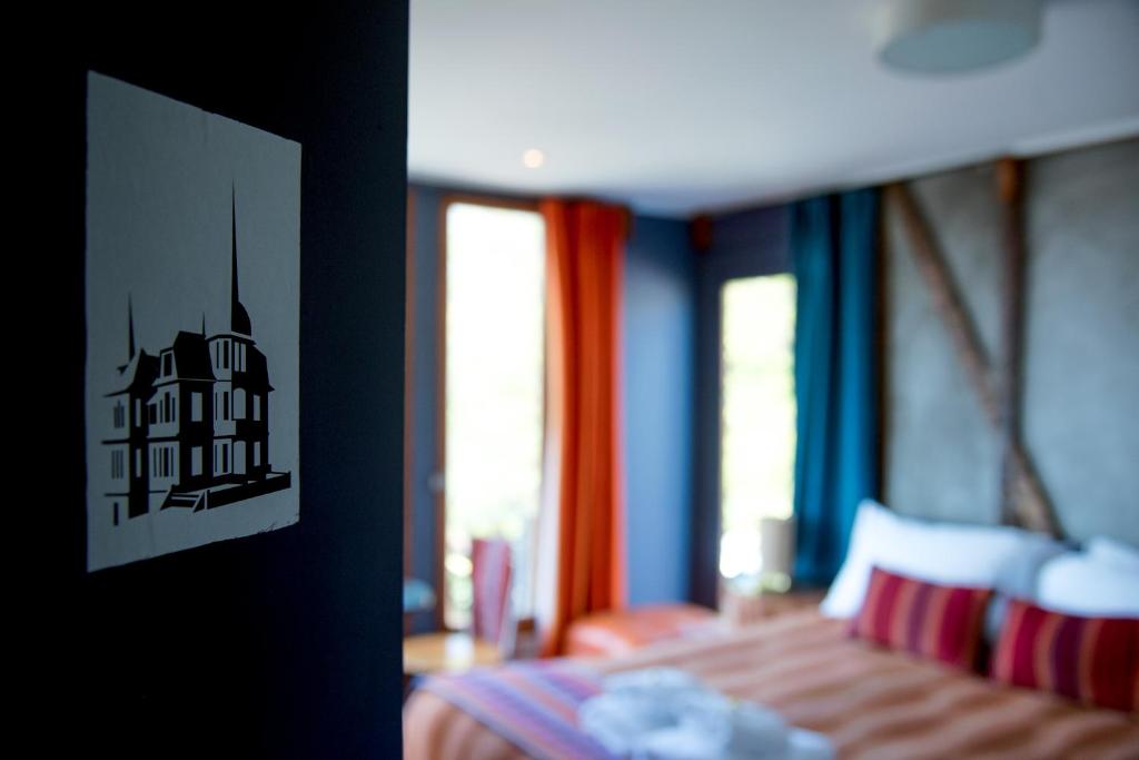 Postel nebo postele na pokoji v ubytování Patio Ferreiro B&B