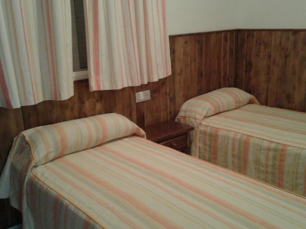 Postel nebo postele na pokoji v ubytování La Era