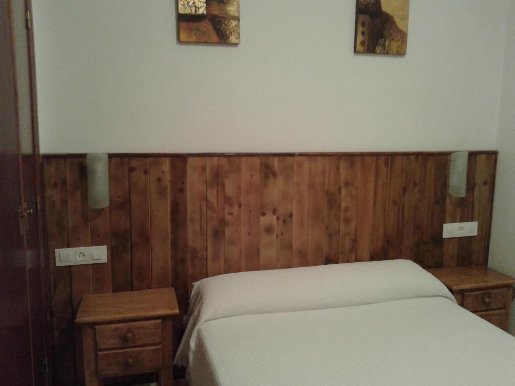 Postel nebo postele na pokoji v ubytování La Era