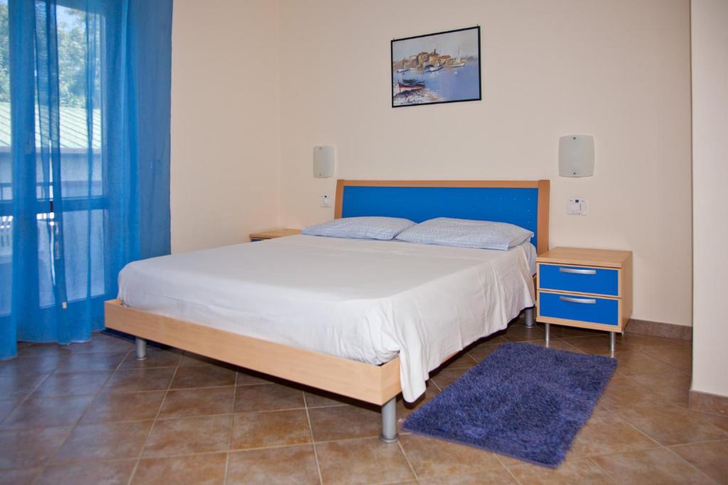 Postel nebo postele na pokoji v ubytování BeB ISIDE