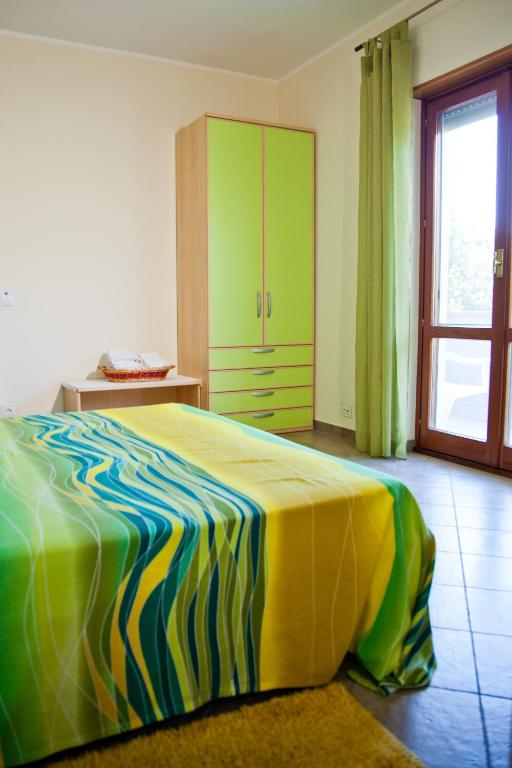 Postel nebo postele na pokoji v ubytování BeB ISIDE
