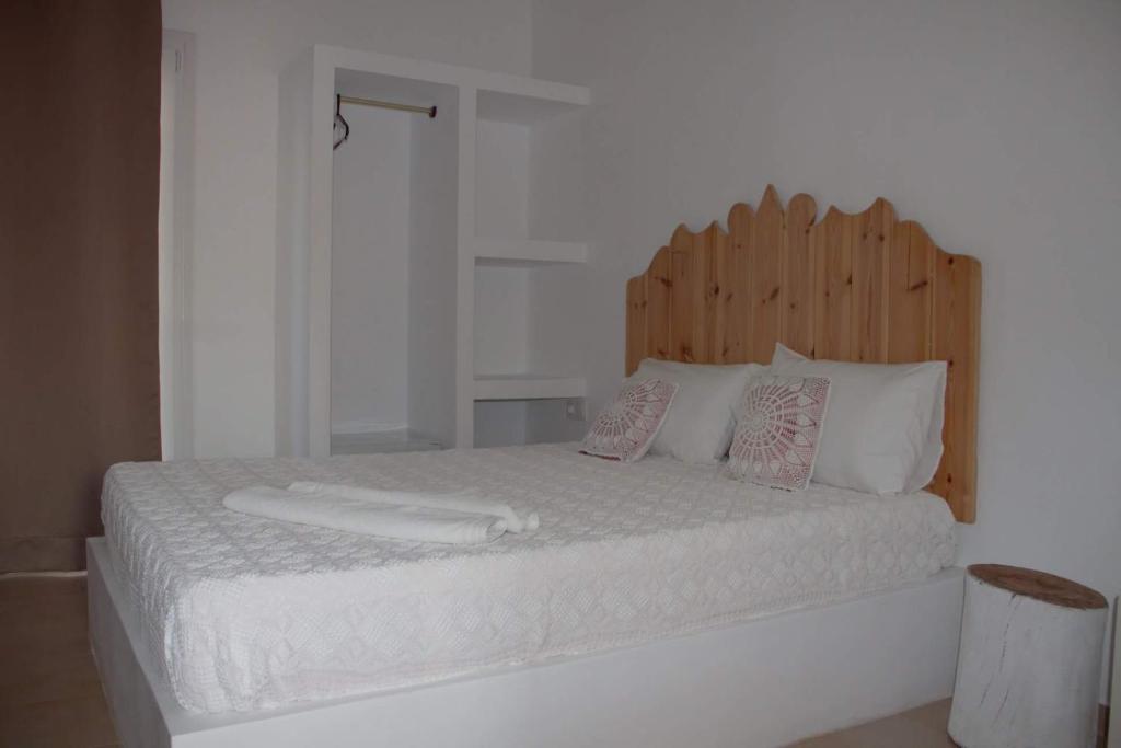 Voodi või voodid majutusasutuse Marias Rooms toas
