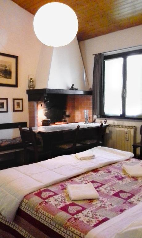 Postel nebo postele na pokoji v ubytování Bed and Breakfast Mimosa