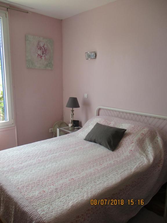 Кровать или кровати в номере Côté Marne