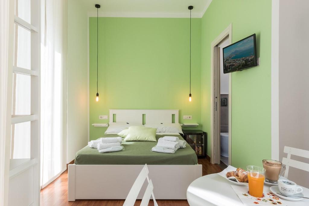 Voodi või voodid majutusasutuse B&B Monserrato toas
