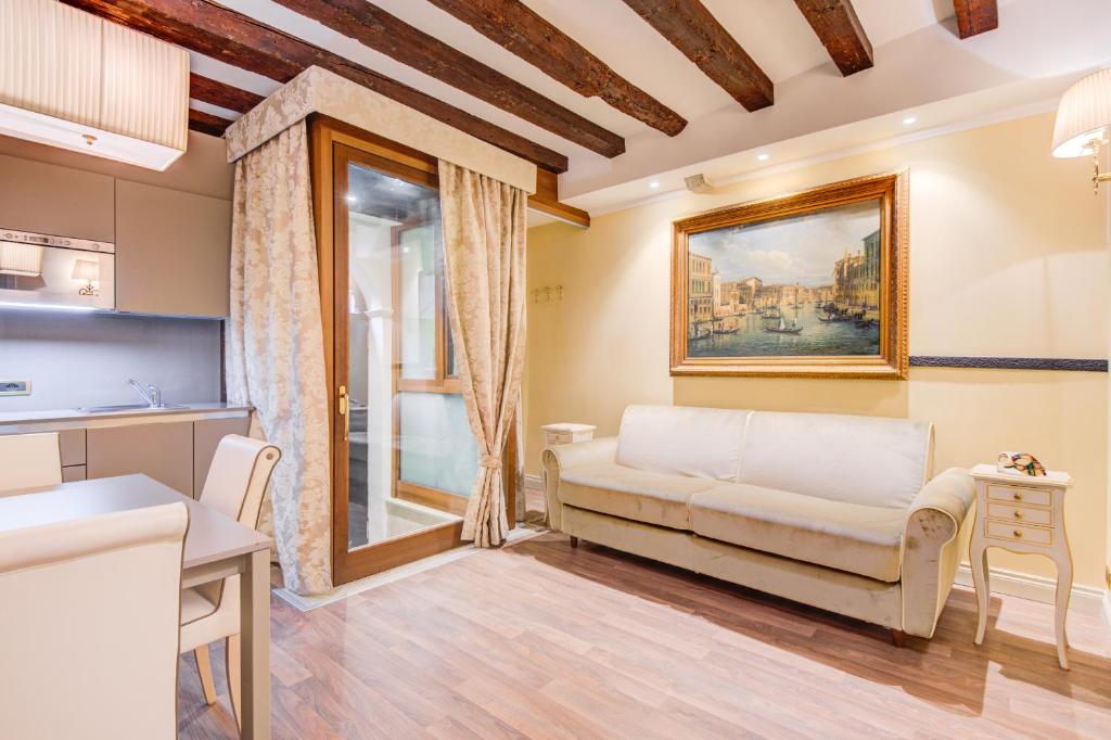 Postel nebo postele na pokoji v ubytování Hotel Al Duca Di Venezia