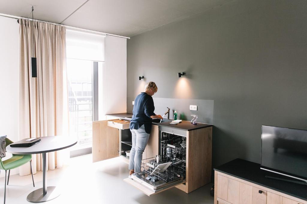 TV a/nebo společenská místnost v ubytování TRUST Hotel
