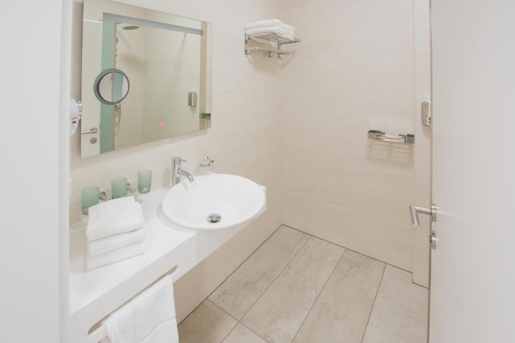 Kúpeľňa v ubytovaní Hotel Rimo