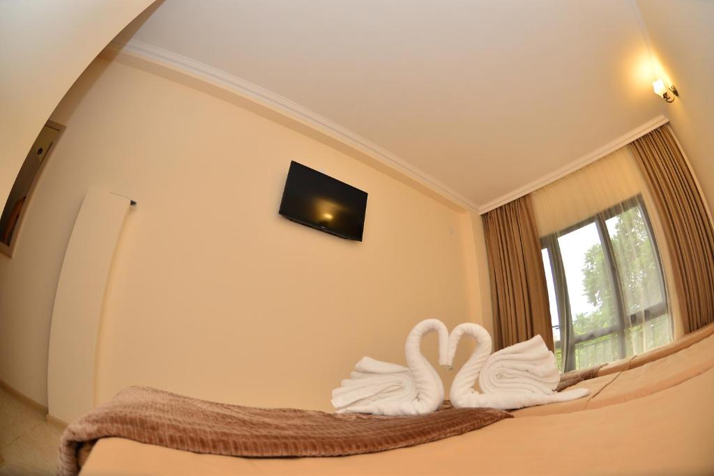 Postel nebo postele na pokoji v ubytování Hotel Gori