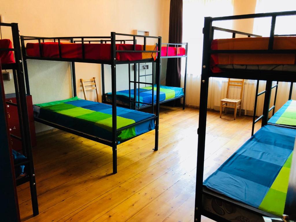 Postel nebo postele na pokoji v ubytování Bude Hostel