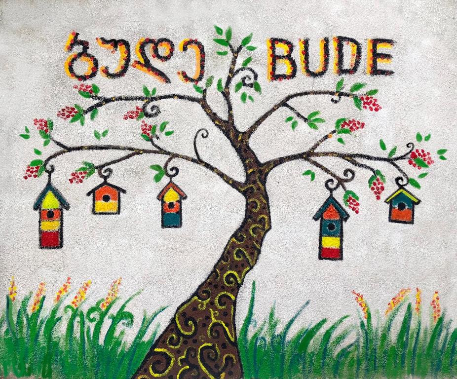 a painting of a tree with birds on it at Bude Hostel in Tbilisi City