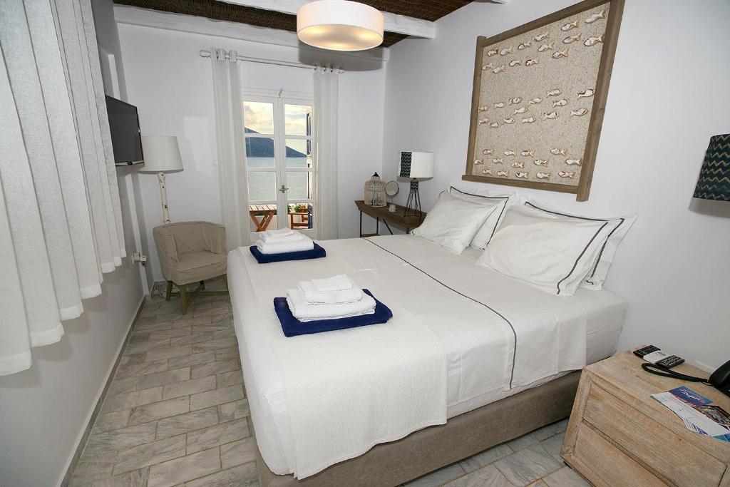 Postel nebo postele na pokoji v ubytování La Playa Boutique Apartments