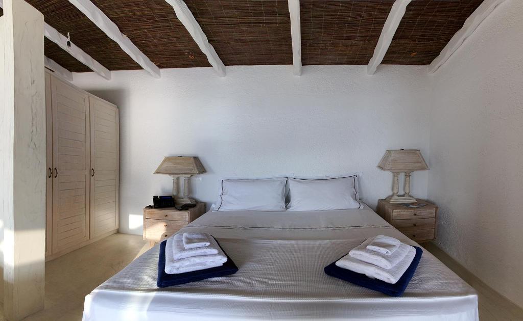 Postel nebo postele na pokoji v ubytování La Playa Boutique Apartments