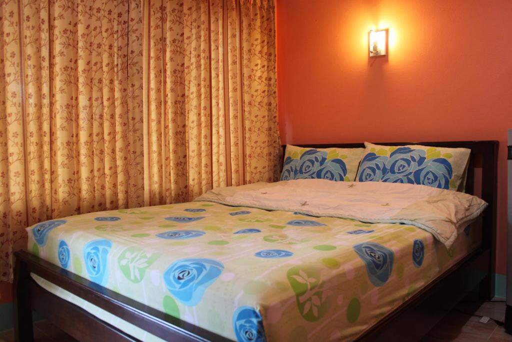Postel nebo postele na pokoji v ubytování Lam-tong Resort