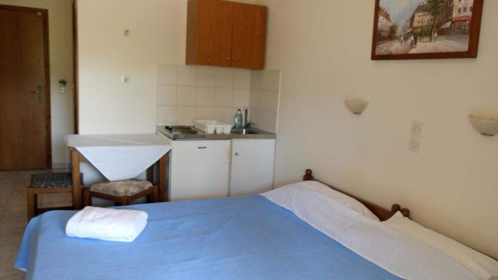 Postel nebo postele na pokoji v ubytování Pansion Chrisa