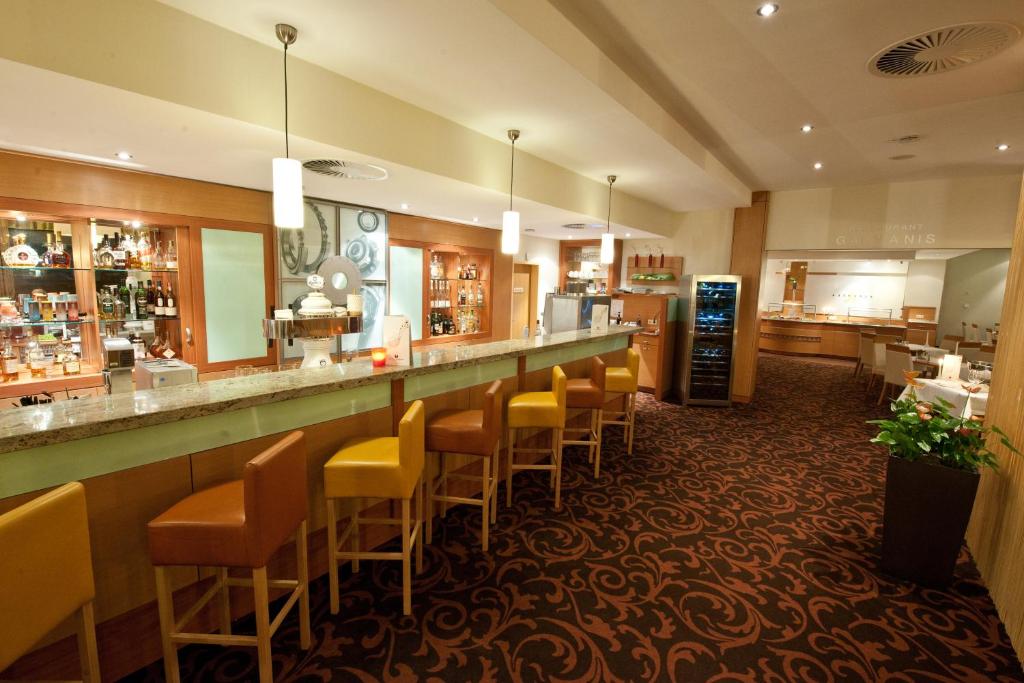 Lounge nebo bar v ubytování Mercure Hotel Schweinfurt Maininsel