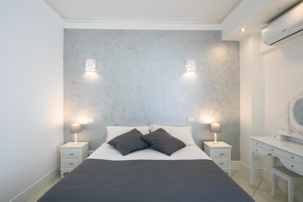 Postel nebo postele na pokoji v ubytování Hotel Bussola