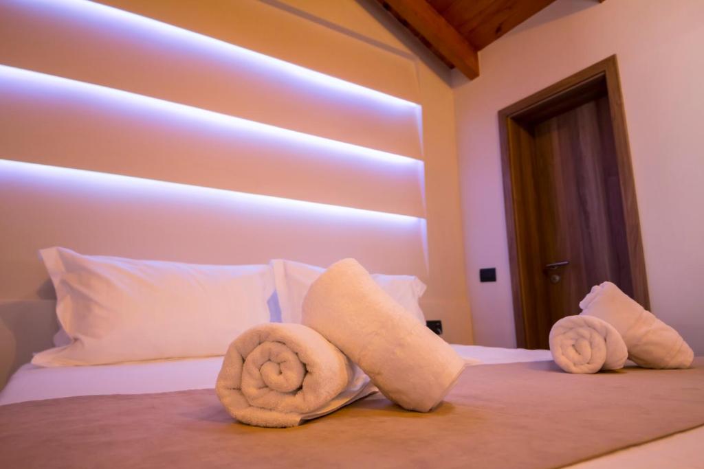 Postel nebo postele na pokoji v ubytování Hotel Pandora Residence