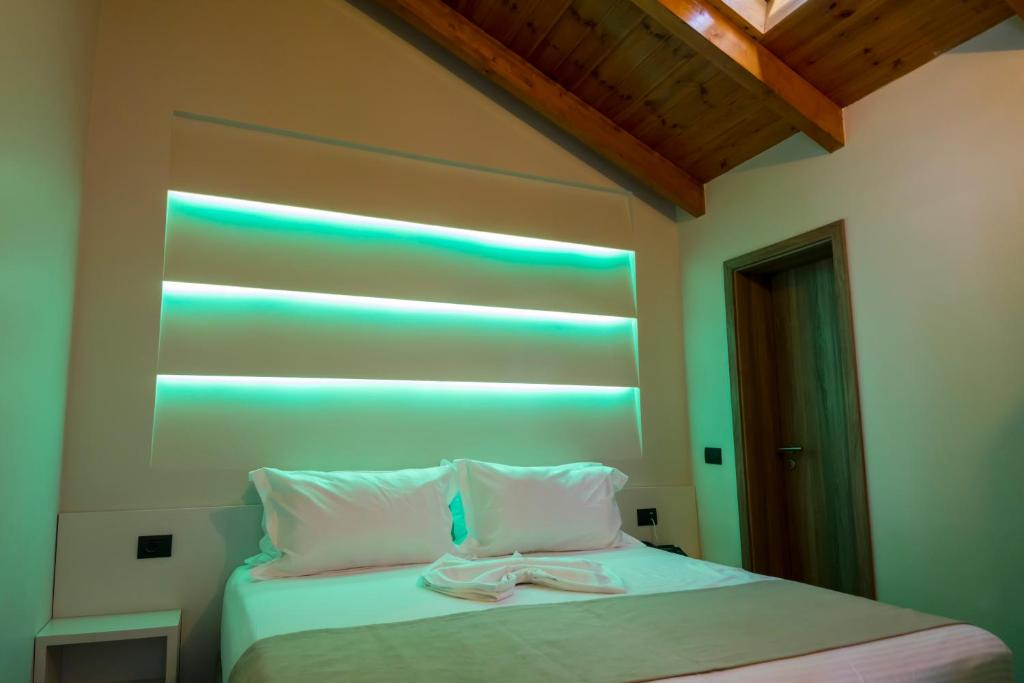 Postel nebo postele na pokoji v ubytování Hotel Pandora Residence