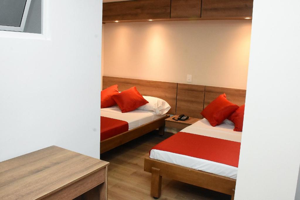 Postel nebo postele na pokoji v ubytování Hotel El Lago 1