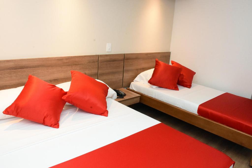 Postel nebo postele na pokoji v ubytování Hotel El Lago 1