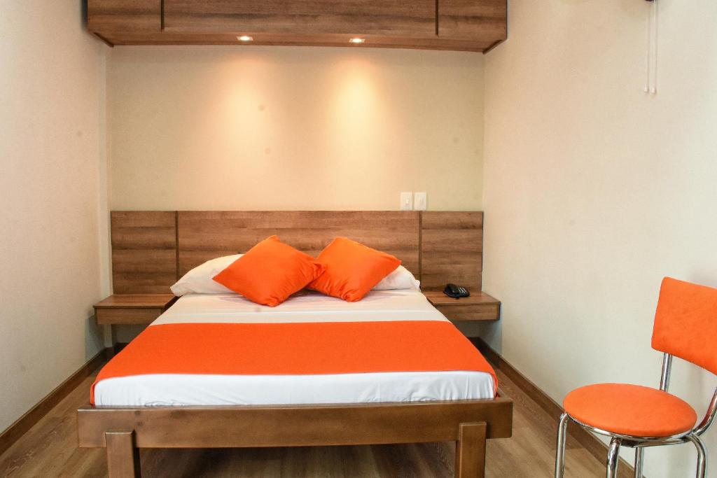Postel nebo postele na pokoji v ubytování Hotel El Lago 1