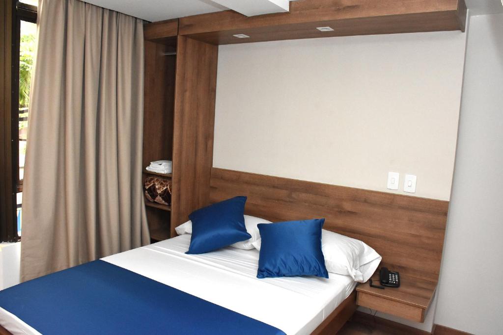 Postel nebo postele na pokoji v ubytování Hotel El Lago 1