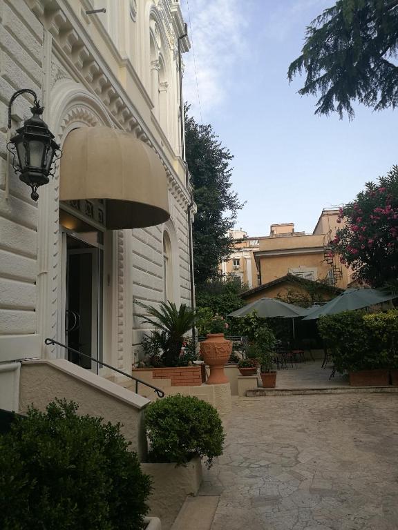 a building with a street light on the side of it at Hotel Villa Delle Rose in Rome