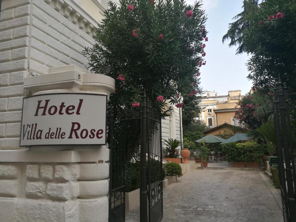 a hotelilla table rose sign on a gate at Hotel Villa Delle Rose in Rome