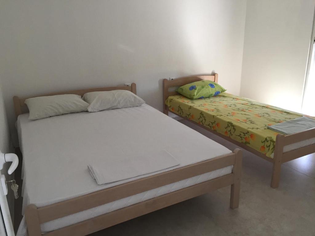Postel nebo postele na pokoji v ubytování Apartments Beho