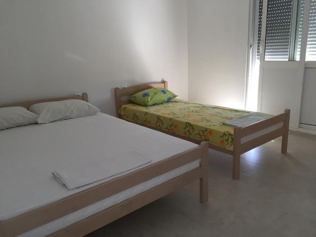 Postel nebo postele na pokoji v ubytování Apartments Beho