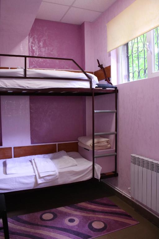 Postel nebo postele na pokoji v ubytování DownTown B&B