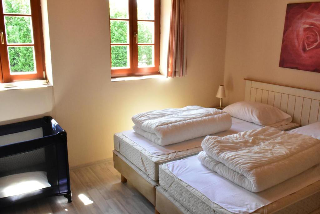 Postel nebo postele na pokoji v ubytování Villa Harta II MAGDA