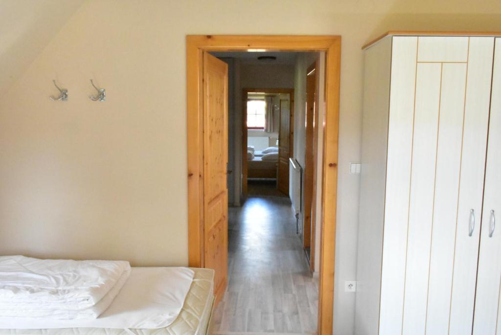 Postel nebo postele na pokoji v ubytování Villa Harta II MAGDA
