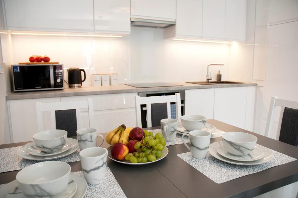 Kuchyňa alebo kuchynka v ubytovaní Gold Platinium apartament z widokiem na morze