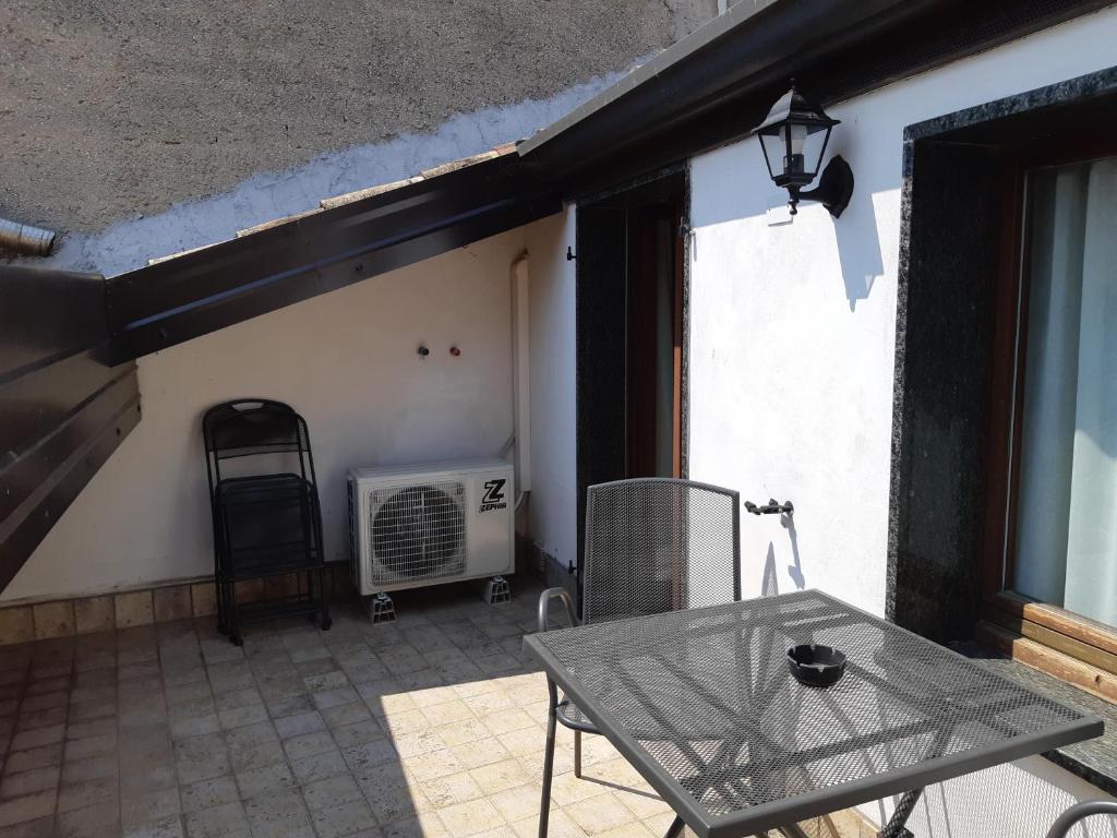 A seating area at Anfite Apartments Castelletto