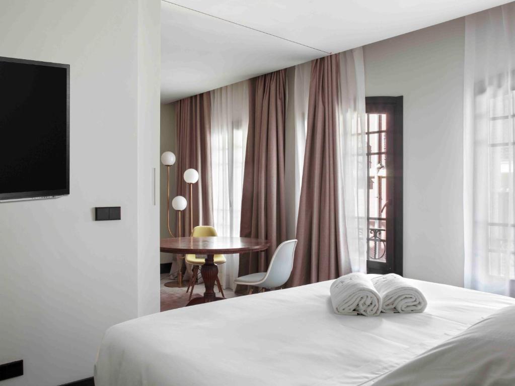 Cama o camas de una habitación en Amor de Dios 17 Boutique Apartments