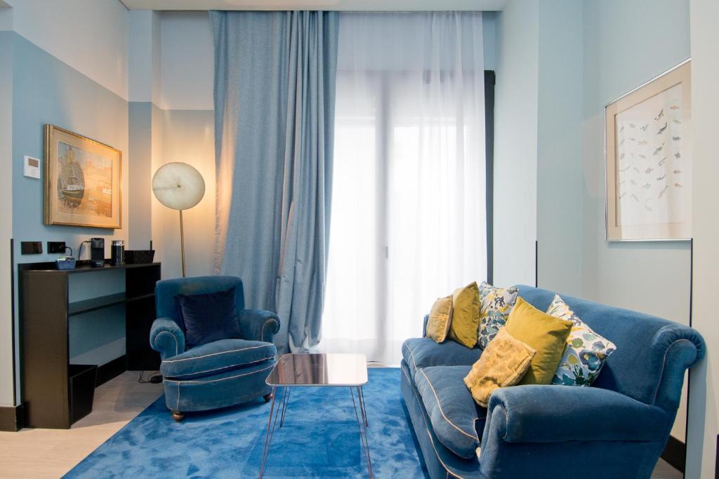 Zona de estar de Amor de Dios 17 Boutique Apartments