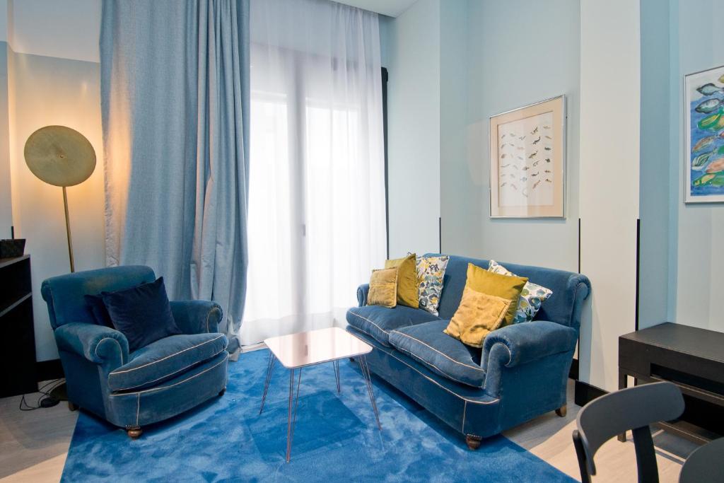 Zona de estar de Amor de Dios 17 Boutique Apartments